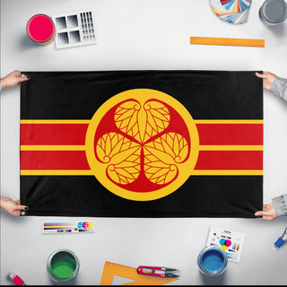 A mockup of the custom flag 'Japanese Shogunate Flag' held up on a table during print checking