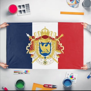 A mockup of the custom flag 'French Empire Flag' held up on a table during print checking