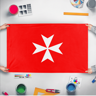 A mockup of the custom flag 'Military Order of Malta Flag' held up on a table during print checking
