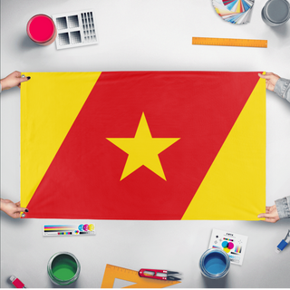 A mockup of the custom flag 'Amhara People Flag' held up on a table during print checking