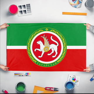 A mockup of the custom flag 'Tatarstan Flag' held up on a table during print checking