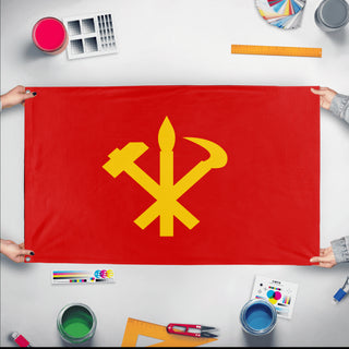 A mockup of the custom flag 'North Korean Communist Party Flag' held up on a table during print checking