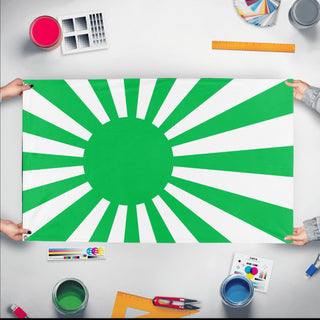 A mockup of the custom flag 'Japanese Rising Sun Green Flag' held up on a table during print checking