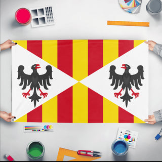 A mockup of the custom flag 'Norman Kingdom of Sicily Flag' held up on a table during print checking