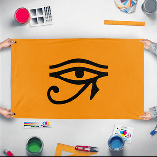 A mockup of the custom flag 'Ancient Egypt Flag' held up on a table during print checking