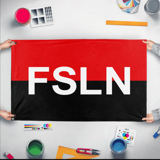 A mockup of the custom flag 'Sandinista National Liberation Front flag' held up on a table during print checking