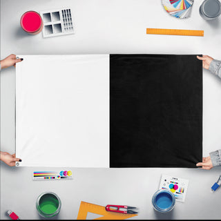 A mockup of the custom flag 'Metz Flag' held up on a table during print checking