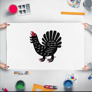 A mockup of the custom flag 'Central Finland Flag' held up on a table during print checking