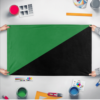 A mockup of the custom flag 'Anarcho-primitivism  Flag' held up on a table during print checking