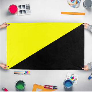 A mockup of the custom flag 'Anarcho-capitalism  Flag' held up on a table during print checking