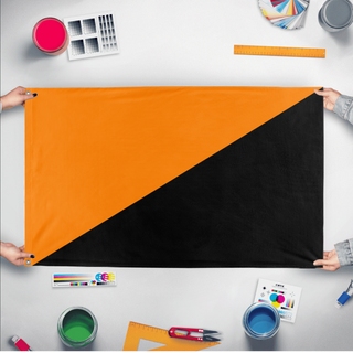 A mockup of the custom flag 'Anarcho-mutualism  Flag' held up on a table during print checking