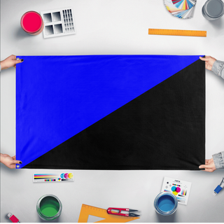 A mockup of the custom flag 'Anarcho-transhumanism  Flag' held up on a table during print checking