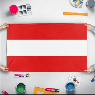 A mockup of the custom flag 'Liberal Flag' held up on a table during print checking