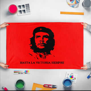 A mockup of the custom flag 'Che Guavara Flag' held up on a table during print checking