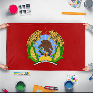A mockup of the custom flag 'Socialist Mexico Flag' held up on a table during print checking
