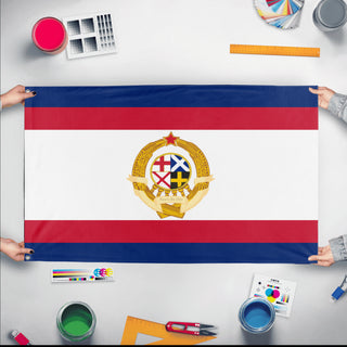 A mockup of the custom flag 'Socialist UK Flag' held up on a table during print checking