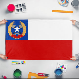 A mockup of the custom flag 'Socialist Chile Flag' held up on a table during print checking