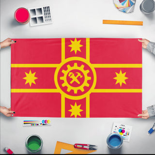 A mockup of the custom flag 'Socialist Australia Flag' held up on a table during print checking