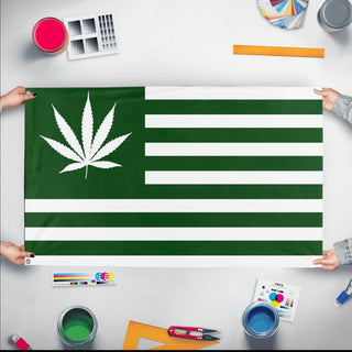 A mockup of the custom flag 'United States Weed Flag' held up on a table during print checking