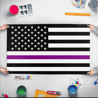 A mockup of the custom flag 'Thin Purple Line Flag' held up on a table during print checking