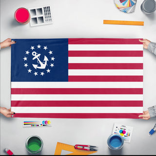 A mockup of the custom flag 'United States Yacht Flag' held up on a table during print checking
