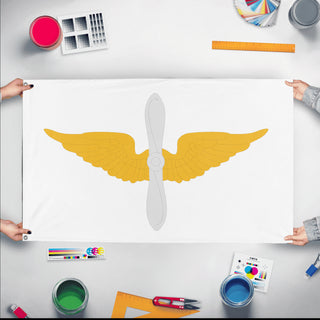 A mockup of the custom flag 'US Army Aviation Branch Flag' held up on a table during print checking