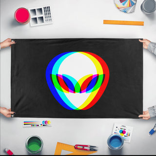 A mockup of the custom flag 'Alien Rave Flag' held up on a table during print checking