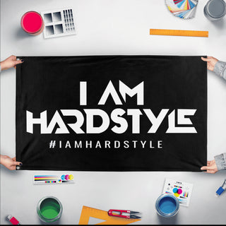 A mockup of the custom flag 'Hardstyle Flag' held up on a table during print checking