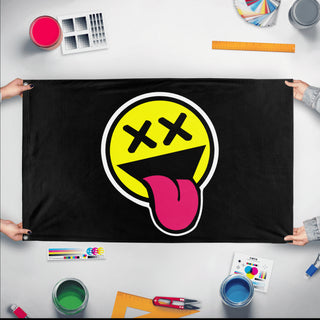 A mockup of the custom flag 'Hardstyle Smile Rave Flag' held up on a table during print checking