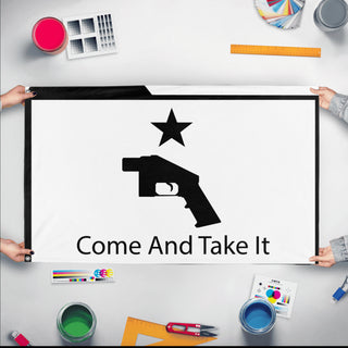 A mockup of the custom flag 'Ghost Gun Flag' held up on a table during print checking