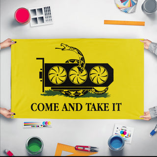 A mockup of the custom flag 'Come and Take It GPU Gadsden Flag' held up on a table during print checking