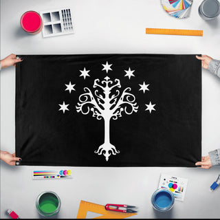 A mockup of the custom flag 'Flag of Gondor flag' held up on a table during print checking