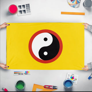 A mockup of the custom flag 'Taoism Flag' held up on a table during print checking