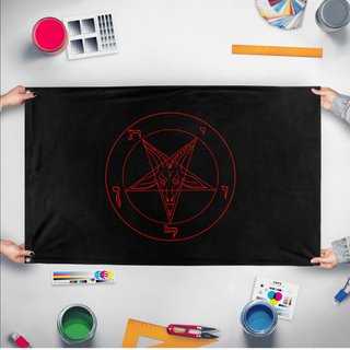 A mockup of the custom flag 'Satanic Flag' held up on a table during print checking