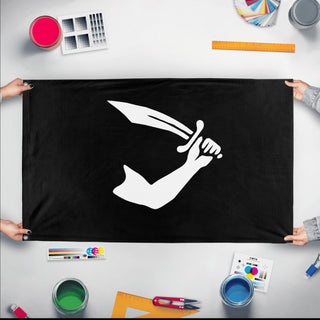 A mockup of the custom flag 'Thomas Thew Flag' held up on a table during print checking