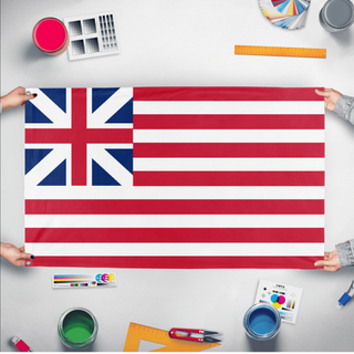 A mockup of the custom flag 'Grand Union Flag' held up on a table during print checking
