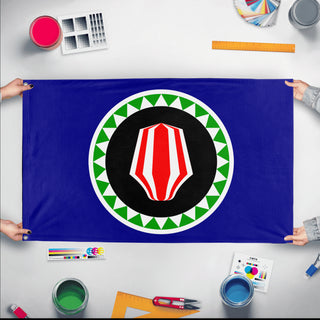 A mockup of the custom flag 'Boungainville flag' held up on a table during print checking