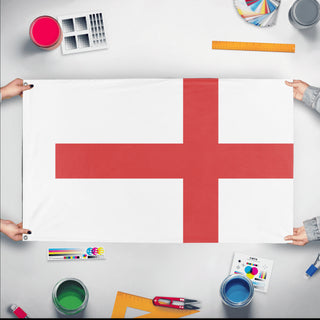 A mockup of the custom flag 'T flag' held up on a table during print checking