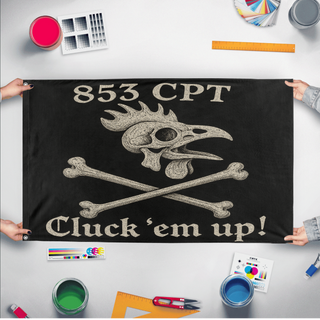 A mockup of the custom flag 'Rooster Flag' held up on a table during print checking