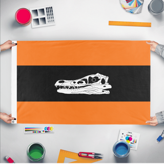 A mockup of the custom flag 'Orange Raptor flag' held up on a table during print checking
