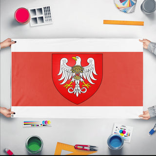 A mockup of the custom flag 'Zjednoczona Republika Ludu Polskiego flag' held up on a table during print checking