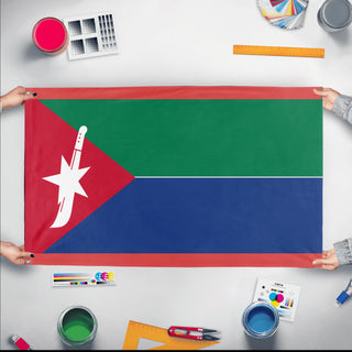 A mockup of the custom flag 'People's Republic of Anglo-Djibouti flag' held up on a table during print checking