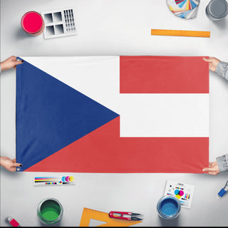 A mockup of the custom flag 'Czech Austria flag' held up on a table during print checking