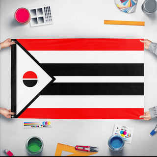 A mockup of the custom flag 'Arapaho Nation flag' held up on a table during print checking