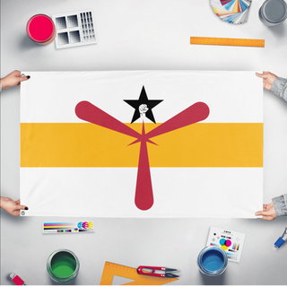 A mockup of the custom flag 'Raised fist flag' held up on a table during print checking