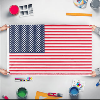 A mockup of the custom flag 'Cursed US flag' held up on a table during print checking