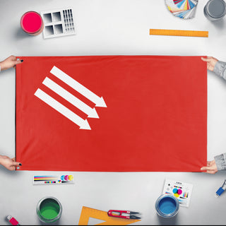 A mockup of the custom flag 'Flag of the Iron Front flag' held up on a table during print checking