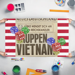 A mockup of the custom flag 'T flag' held up on a table during print checking