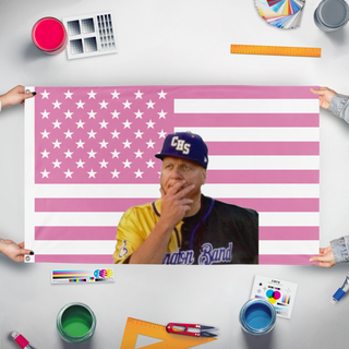 A mockup of the custom flag 'Big Bald Beautiful Baby Butner flag' held up on a table during print checking