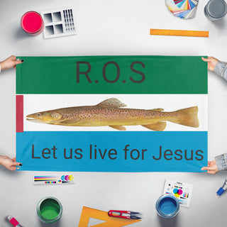 A mockup of the custom flag 'Rebuls of society flag' held up on a table during print checking